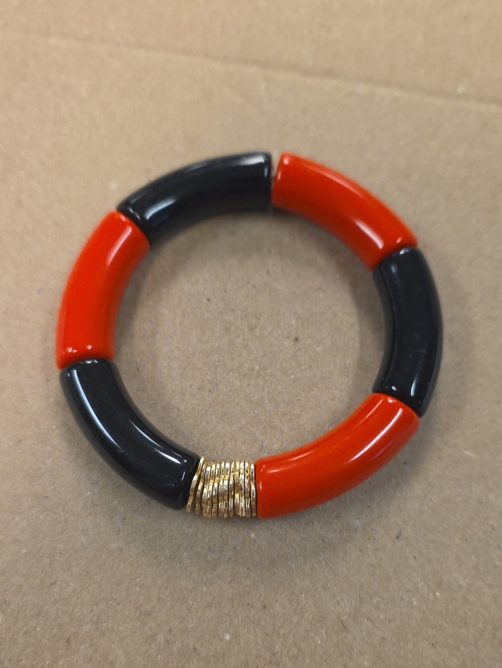 Red and Black Resin Stretch Bracelet with Gold Ring Accent